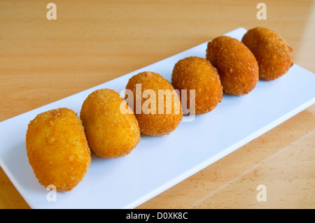 Spanish appetizer: croquettes serving. Spain. Stock Photo