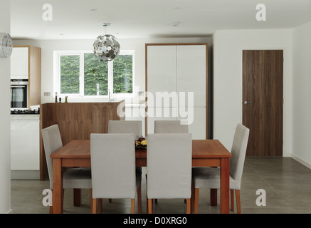 Table and chairs in dining area Stock Photo