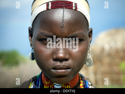 Portrait Of An Erbore Tribe Woman With Necklaces, Headband And Earrings, Weito, Omo Valley, Ethiopia Stock Photo