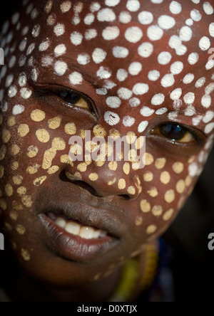 Close Up Portrait Of Erbore Tribe Boy With Face Paint And Toothy Smile, Weito, Omo Valley, Ethiopia Stock Photo