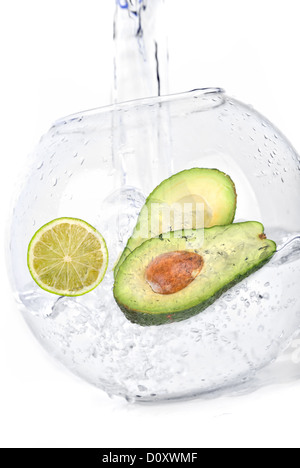 limes in water avocado Stock Photo