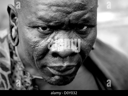 Black And White Portrait Of Surma Tribe Warrior With Enlarged Ears, Tulgit, Omo Valley, Ethiopia Stock Photo