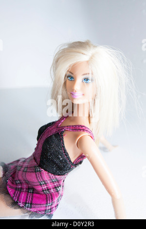 Barbie doll sitting in shallow water Stock Photo