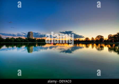 Twilight just after sunset over lake in City Park, Denver, Colorado. Stock Photo