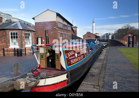 Coal boat at Cambrian Wharf on the Birmingham and Fazeley Canal and Farmers Bridge Locks, Birmingham, West Midlands, England, UK Stock Photo