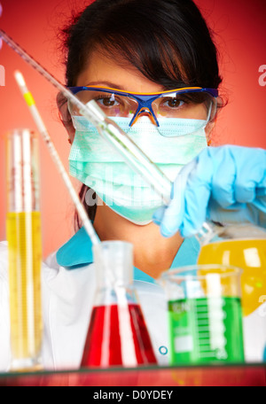 scientist in laboratory with test tubes Stock Photo