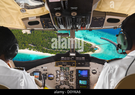 Pilots in the plane cockpit and island Stock Photo