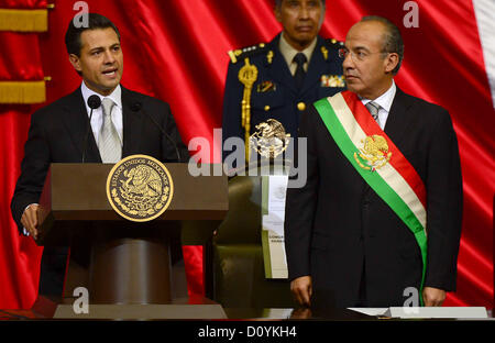 Dec. 1, 2012 - Mexico, Distrito Federal, MEXICO - Enrique Pena Nieto, left, addresses the attendees next to outgoing president Felipe Calderon during the presidential inauguration ceremony at the National Congress in Mexico City, Saturday, December 1, 2012. (Credit Image: © Alex Gonzalez/Prensa Internacional/ZUMAPRESS.com) Stock Photo