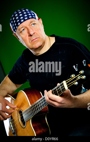 man with a guitar, bass player Stock Photo