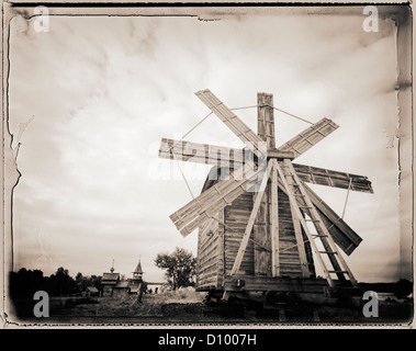 Wooden windmill under cloudy skies, Kizhi Island, Russia. Stock Photo