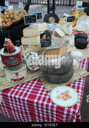 Specialty cheeses on sale at Tynemouth station flea market north east England UK Stock Photo