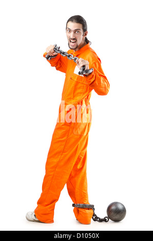 Criminal in orange robe in prison Stock Photo