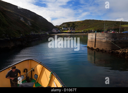 The Ferry approaching The North Harbour, Cape Clear Island, County Cork, Ireland. Stock Photo