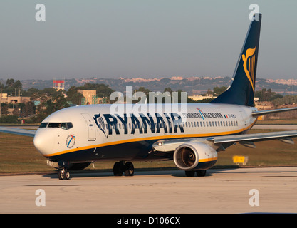 Low cost air travel. Boeing 737-800 passenger jet plane belonging to budget airline Ryanair taxiing for departure on a flight. Cheap flights. Stock Photo