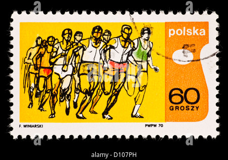 Postage stamp from Poland depicting runners. Stock Photo