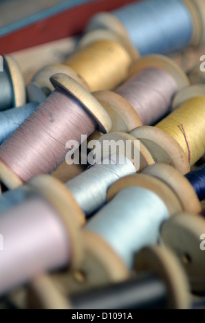 wooden cotton reels Stock Photo