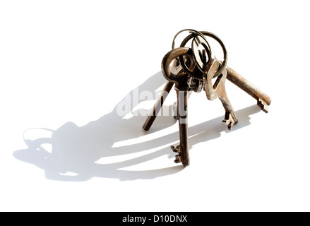 bunch of old keys isolated on white background with shadow Stock Photo