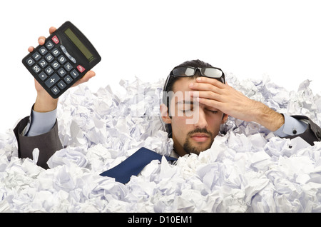 Man with lots of waste paper Stock Photo