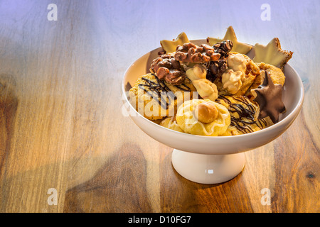 Christmas cookies in a bowl on a table made from wood Stock Photo