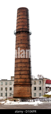 Tall red brick industrial smoke stack or chimney Stock Photo