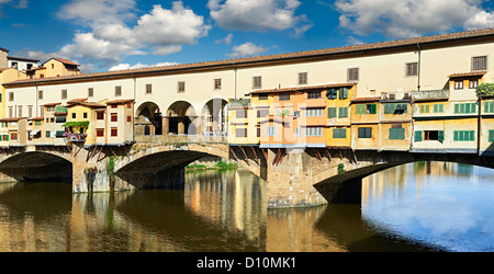 Panoramic panorama of The Ponte Vecchio bridge with its shops spanning the Arno River, Florence Italy Stock Photo