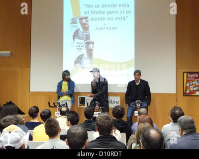 4st december evening in Casa del Libro bookstore in Passeig de Gràcia, Barcelona. Josef Ajram (center) is a bank broker and a reputate athlete (He was 2nd in the Titan Dessert Competition in 2006) and has presented his book 'I don't know where are the limits but I know where they aren't'. Talking comician Santi Millan (has written introduction). Right, editor of the book. Stock Photo