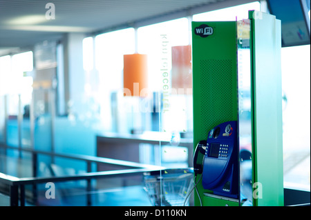 Telephone box in an international airport Stock Photo