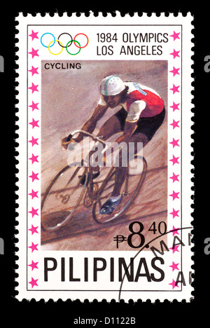 Postage stamp from the Philippians depicting a track cyclist, issued for the 1984 Summer Olympic Games in Los Angeles, 1984. Stock Photo