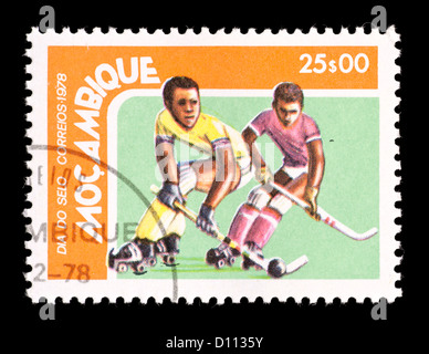 Postage stamp from Mozambique depicting roller hockey players. Stock Photo