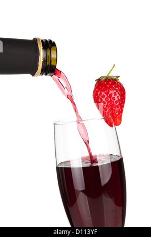 Wine collection - Strawberry champagne pouring down from a bottle. Isolated on white background Stock Photo