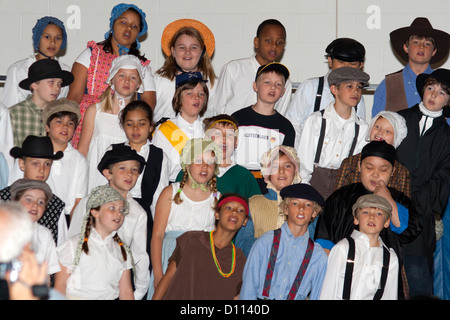 School student choir age 10 presentation of Minnesota history in costume. Horace Mann School. St Paul Minnesota MN USA Stock Photo