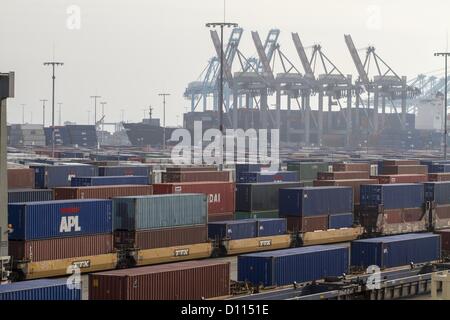 Dec. 4, 2012 - Los Angeles, California (CA, United States - The APM shipyard stands idle after workers worked off the jobs at the Port of Los Angeles Tuesday December 4, 2012 in Los Angeles, California. The strike was launched last Tuesday by the 800-member International Longshore and Warehouse Union Local 63 Office Clerical Unit, which had been working without a contract since June 30, 2010. With some 10,000 ILWU members honoring the strikers' picket lines, the action has shut down 10 of the 14 cargo container terminals at the complex. At least 11 ships have diverted cargo to other ports, inc Stock Photo