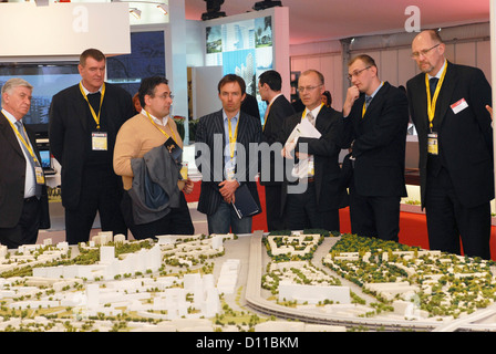FRANCE, CANNES 10th March 2009 MIPIM, the world's biggest property fair Investors look at model of Krasnoder region, Russia Stock Photo