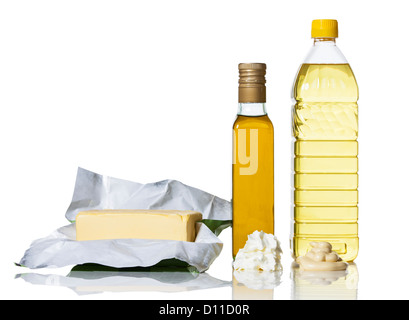 Butter, two types of oil, whipped cream and mayonnaise on white background. Low carb hi fat diet. LCHF. Stock Photo