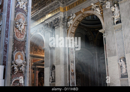 Illumination and revelation in Vatican : the light of august coming into St. Peter's Basilica, in Rome. Stock Photo