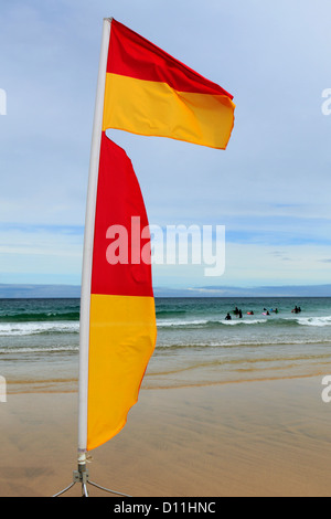 Safe Swimming Flag, St Ives surfing beach, St Ives Bay, Cornwall County; England; UK Stock Photo