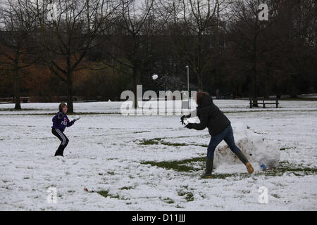 Chelmsford, Essex, 5th December 2012, Local children take advantage of the closed schools by playing in the snow at Chelmsford's Central Park. Credit:  Matt Wing / Alamy Live News Stock Photo