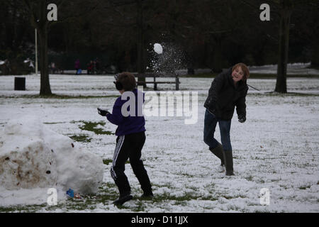 Chelmsford, Essex, 5th December 2012, Local children take advantage of the closed schools by playing in the snow at Chelmsford's Central Park. Credit:  Matt Wing / Alamy Live News Stock Photo