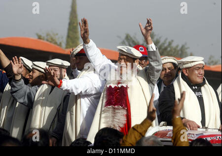 PESHAWAR, PAKISTAN, DEC 05: World Fame Japanese Muhammad Hussain Inoki and his  team arrive to participate in “Wrestling for Peace Festival 2012” held at Qayyum Stadium in  Peshawar on Wednesday, December 05, 2012. (Fahad Pervez/PPI Images). Stock Photo