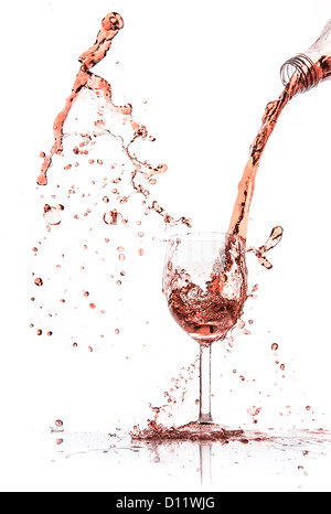 rose wine splashing on white background Stock Photo