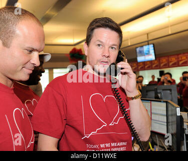 December 5, 2012. Toronto, Canada. Hollywood star Mark Wahlberg joins traders at CIBC trading floor for the annual CIBC Miracle Day to raise fund for children's charity in Canada.  (DCP/N8N) Stock Photo