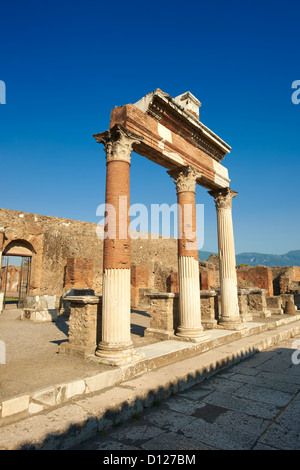 The Roman Corinthian Porticus, columns & tables of the money changers at the entrance of the Macellum in the Forum of Pompeii Italy Stock Photo