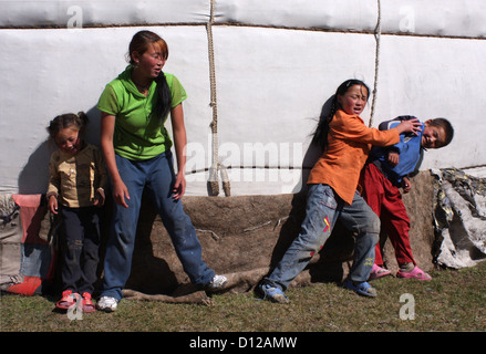 nomadic children playing mongolia mongolian Stock Photo - Alamy