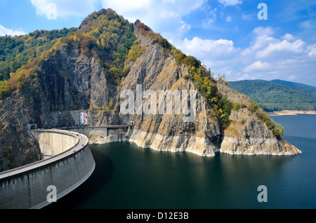 Vidraru lake and dam in Fagaras massif (Romania) in Carpathian mountains. Stock Photo