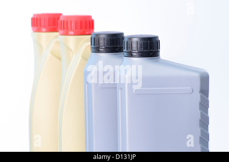 three engine oil bottles isolated on white Stock Photo