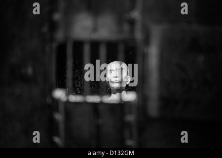 Model of a prisoner incarcerated in the Hanoi Hilton prison in Hanoi Vietnam Stock Photo