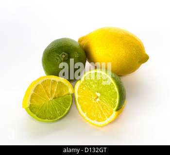 Swapped lemon and lime halves on a white background Stock Photo