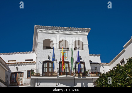 Flags flying outside Town Hall, Nerja, Spain Stock Photo