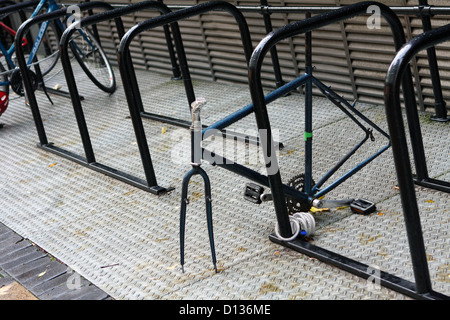A vandalised bike in London Stock Photo