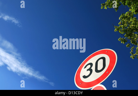 Speed limit sign of a 30 km/h restriction zone Stock Photo - Alamy